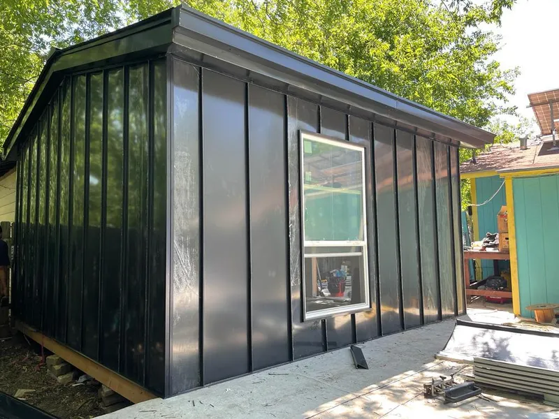 Black standing seam metal wall panels for Roof Inspection in Phoenix